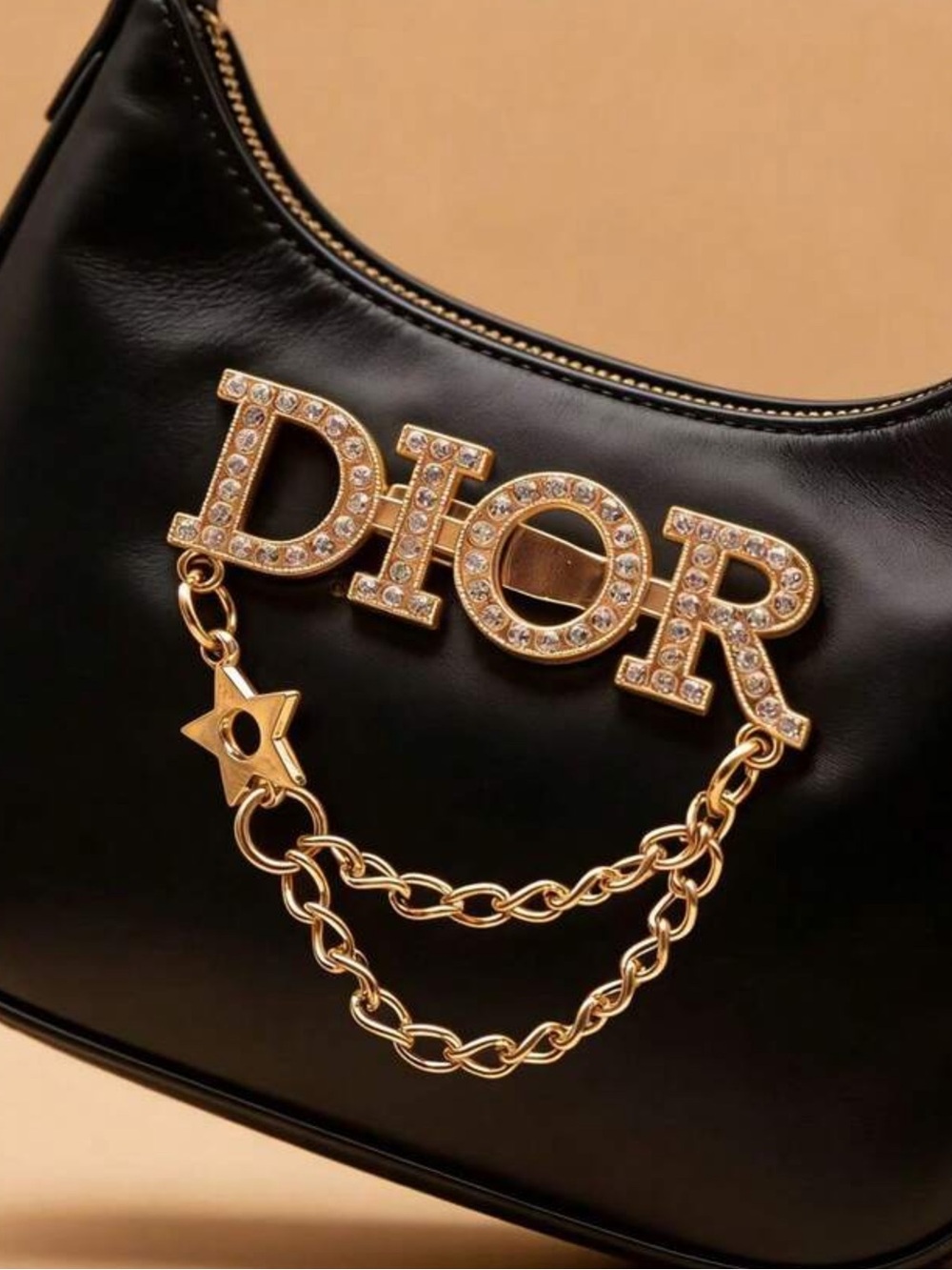 Dior broche dorado